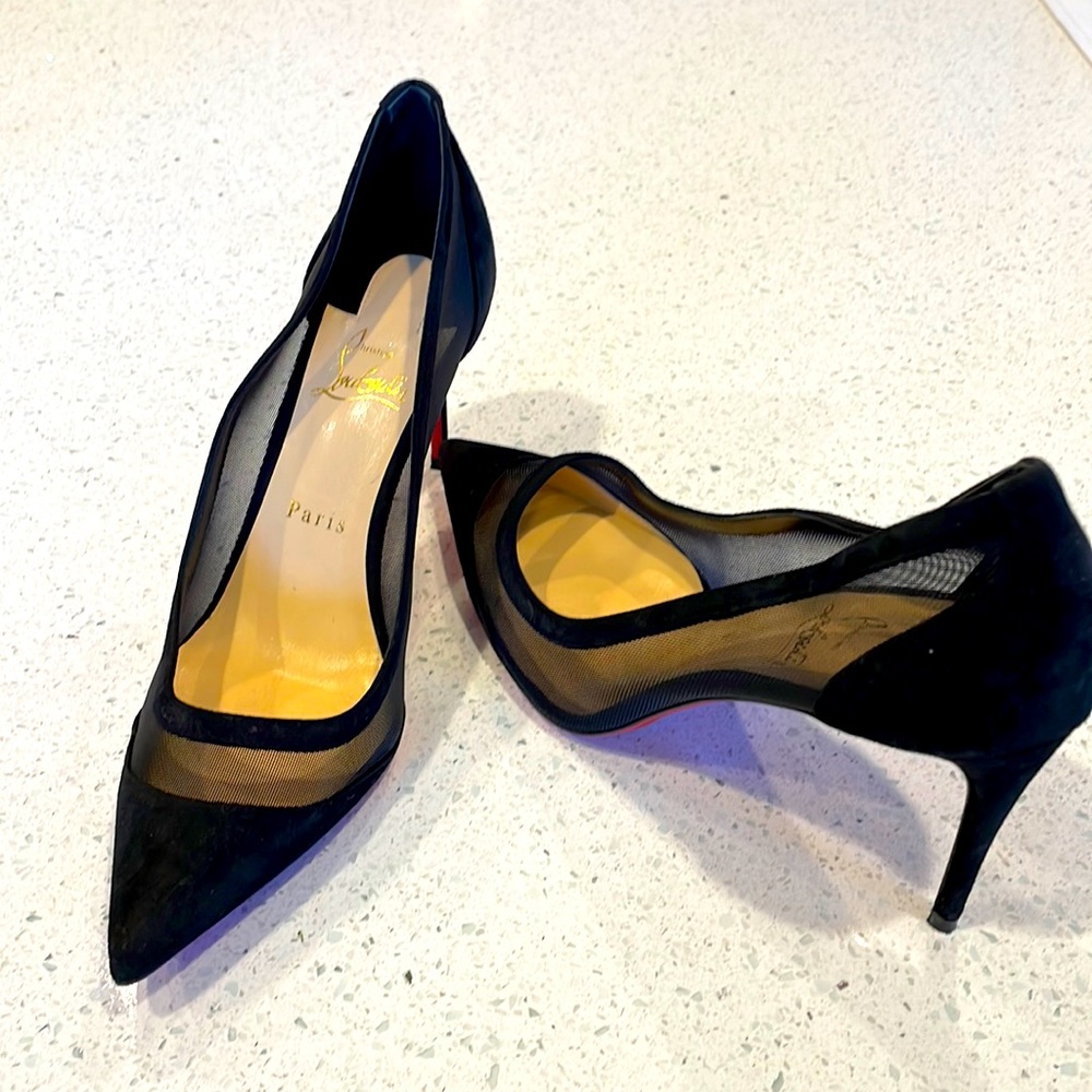 Like new Louboutins. Low black suede pump with mesh detail.